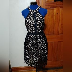 Forever 21 black lace dress with tan lining in Size S